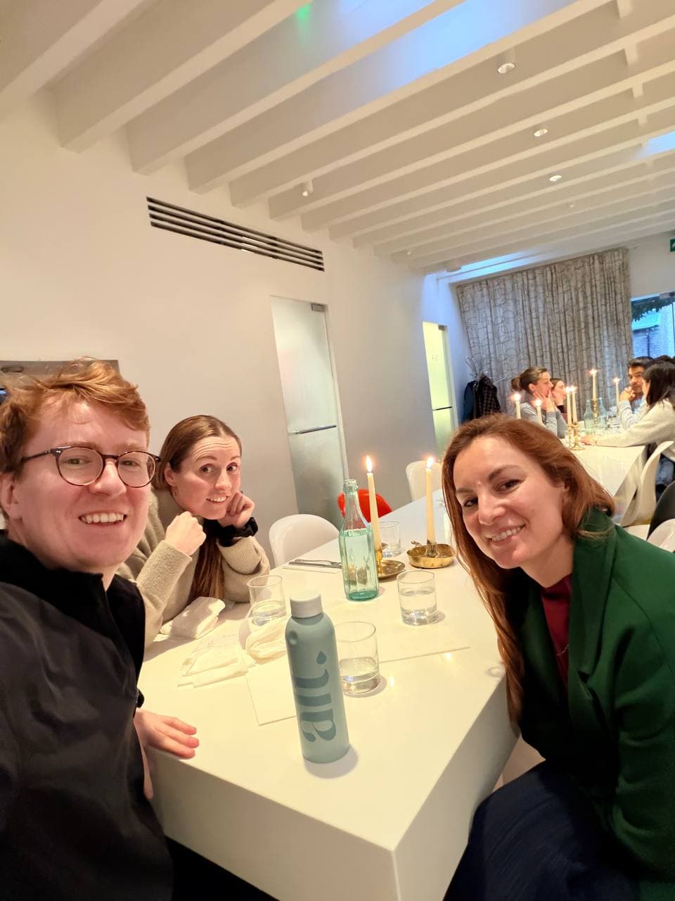 Fam Consulting team at a dinner table